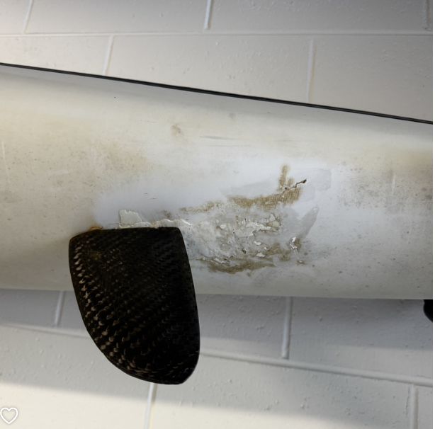 damage to rear of base of ski